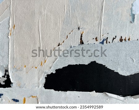 Abstract urban city torn and weathered placard paper layers  Royalty-Free Stock Photo #2354992589