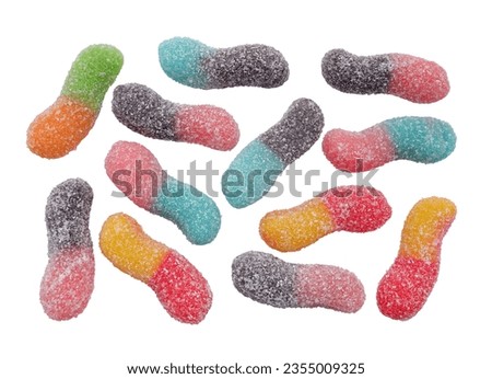 Colorful sour gummy worm isolated on white background with clipping path. sugar coated sour tasting gummy worms, top view,full depth of field