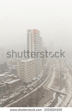 a picture of a snowy cityscape