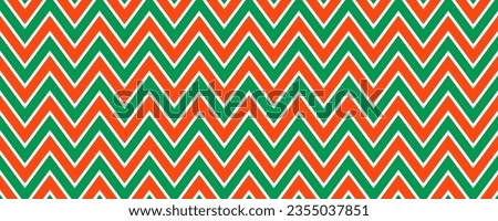 Red and green seamless pattern. Candy cane zigzag stripes background. Christmas repeating decoration wallpaper. Winter holiday lines backdrop. Xmas peppermint package wrapping print. Vector