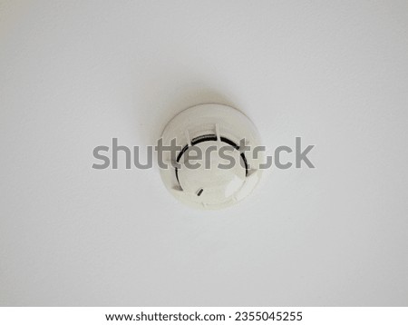 Smoke detector on the ceiling in case of fire alarm.