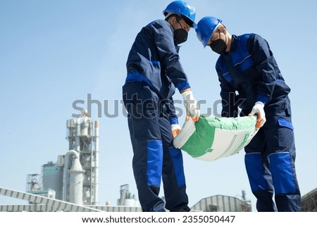 Cement factory employee stock photo