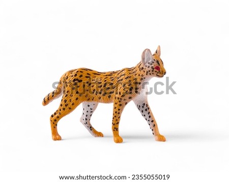 Miniature animal serval cat on white background