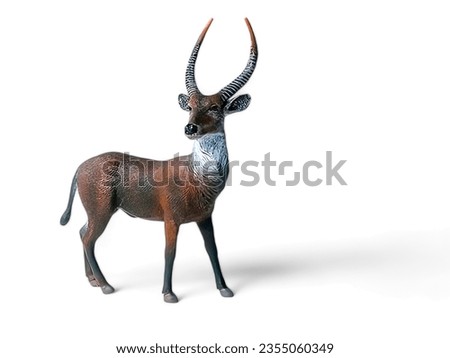 Miniature animal waterbuck deer on white background