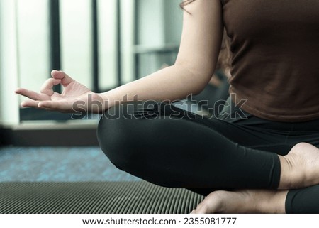 
Easy Seat pose Female Attractive asian woman doing yoga stretching exercise on mat yoga fitness exercises. Healthy lifestyle Calmness and relax