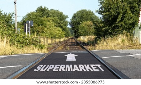 Street Sign the Direction Way to Supermarket
