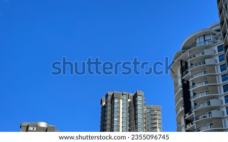 Architecture Building under a blue sky: Background, Clear Sky, Beautiful, Work, Scene, City, Urban, Australia, America, Company, European, London, Tower, Corporation, Business, Hotel, Finance
