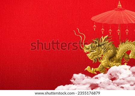 Happy new year 2024 year of the dragon on red cloth background. Royalty-Free Stock Photo #2355176879