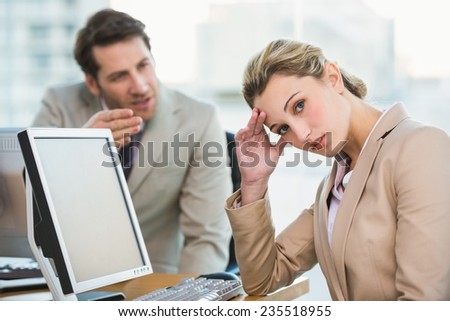 Businessman arguing with a colleague at work Royalty-Free Stock Photo #235518955