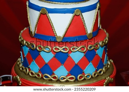 festive chocolate cake with pictures and circus theme - delicious colorful birthday cake with chocolate