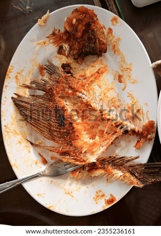 
Food photography is a still life genre used to create attractive, idealized representations of food to enhance its marketing appeal to consumers. photo after eating on the dining table.