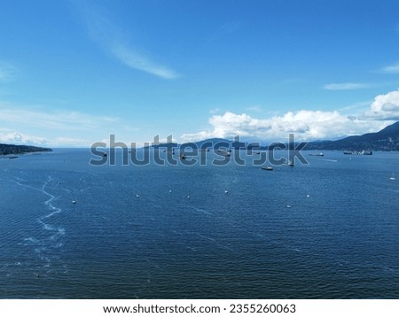 An aerial view of the ship vessel and beach near the city of Vancouver, Canada