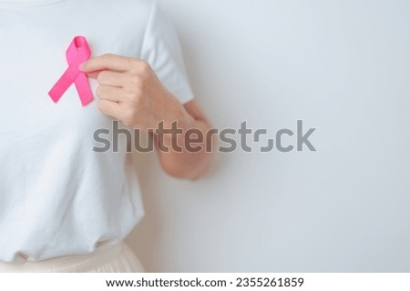 Pink October Breast Cancer Awareness month, woman with pink Ribbon in hospital for support people life and illness. National cancer survivors month, Mother and World cancer day concept Royalty-Free Stock Photo #2355261859