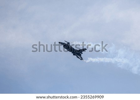 A beautiful view of a Military aircraft in a blue sky