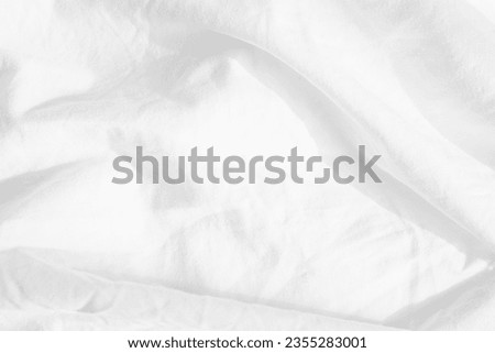 Abstract White Bedding Sheets or White wrinkled fabric background texture and Texture with copy-space :Creased or wrinkled white fabric,Soft focus Royalty-Free Stock Photo #2355283001