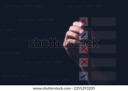 Businessman using pen tick mark and cross in checkbox for quality document control checklist and business approve project concept. Successful completion of business tasks. management goal strategy