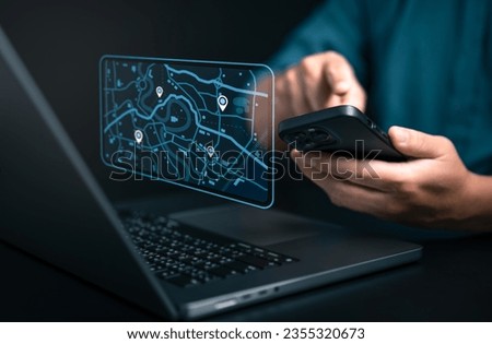 Businessman using smartphone and computer to search map with geolocation points. Synchronize GPS, Mark destination trip app and find business places by online map system, Exploring target location. 
