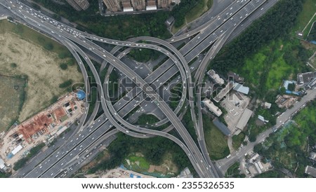 An aerial drone shot of a round highway interchange in Longquanyi District, Chengdu city, Sichuan Province, China