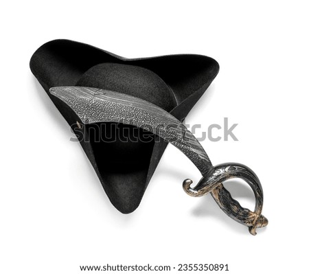 Pirate hat and sword isolated on white background