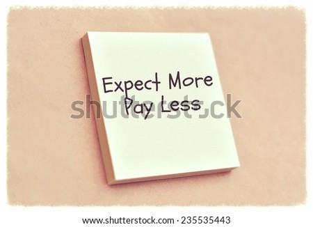 Text expect more pay less on the short note texture background