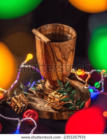 Festive Christmas Beverage in Wooden Glass - Yuletide Party Cocktail with Twinkling Christmas Lights
