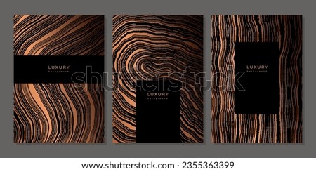 Set of templates. Luxury golden background with wood annual rings texture. Banner with tree ring pattern. Stamp of tree trunk in section. Wooden concentric circles. Black and bronze marble background Royalty-Free Stock Photo #2355363399