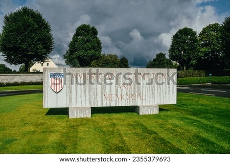 Photo of the sign outside of Brittany American Cemetery in honor of Normandy Landings in France.