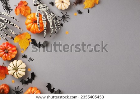 Infusing our Halloween party with a delightful mix of chills, thrills. Top view photo of skeleton hands, pumpkins, autumn leaves, scary insects on grey background with ad placement