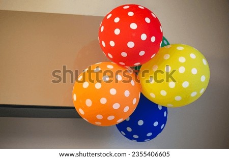 Colored balloons red, green, blue, orange, blue hanging, birthday