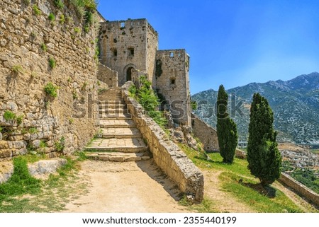 Summer mediterranean landscape - view of the stairs in the Klis Fortress, near Split on the Adriatic coast of Croatia