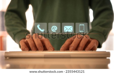 Businessman using wireless computer keyboard searching web, browsing information, contact, having workplace at home. concept Contact us or Customer support hotline people connect, customer services