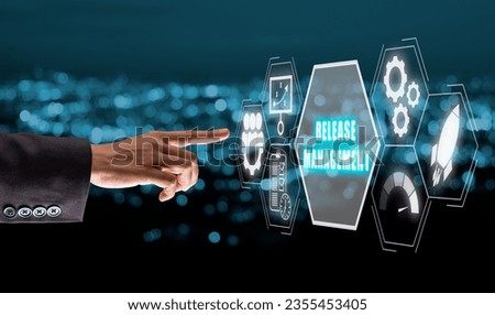 Release management concept, Business hand touching Release management icon on virtual screen. Royalty-Free Stock Photo #2355453405