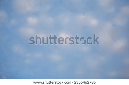 clouds in the blue sky, photo as a background, digital image