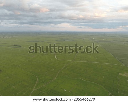 

Aerial photography of farmland and villages in the evening
