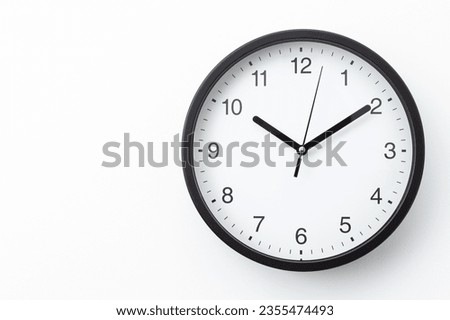 Wall clock on white background.