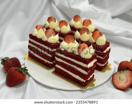 Strawberry cream cheese cake. 
cheesecake on a wooden plate. Fresh  Strawberry topping with cream and thyme leaves. Bakery picture free space for text.