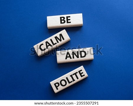 Be Calm and Polite symbol. Concept words Be Calm and Polite on wooden blocks. Beautiful deep blue background. Business and Be Calm and Polite concept. Copy space