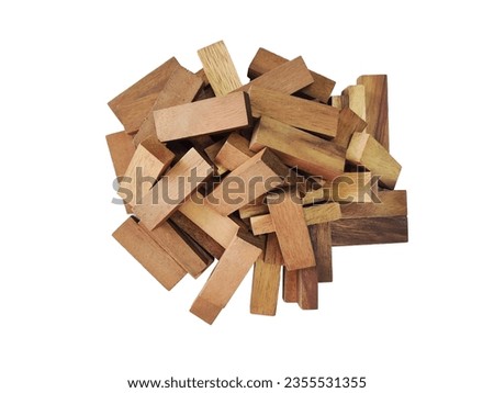 a pile of wood stacked on a white background