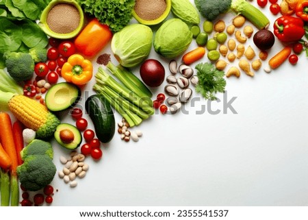 An overhead shot capturing a diverse selection of healthy foods, leaving room for text. Royalty-Free Stock Photo #2355541537