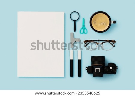 Back to school flat lays on blue background. Blank magazinecover mockup with photography concept flat lay