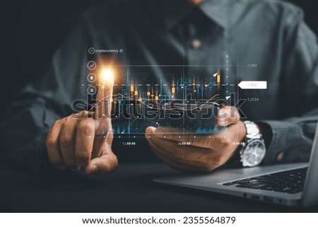 Investment planning and strategy concept. Trader man points at a virtual hologram stock on a screen, symbolizing the possibilities of stock market trading for business growth and financial success.