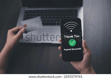 Smartphone with Online payment, Hand hold smartphone banking online bill payment Approved concept button, credit card and network connection icon on business technology virtual screen background