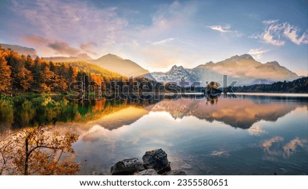 Fantastic autumn sunset of Hintersee lake Royalty-Free Stock Photo #2355580651