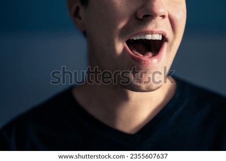 Sing, talk or speak. Singer mouth open. Man with loud sound of voice. Pronunciation in language education, articulation exercise or vocal lesson. Song in music studio. Speech or karaoke. Yell or shout Royalty-Free Stock Photo #2355607637