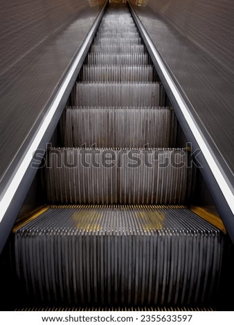 escalator stairs, from the basement to the first beach 