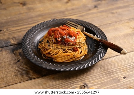 Spaghetti alla sassina with canned whole tomatoes