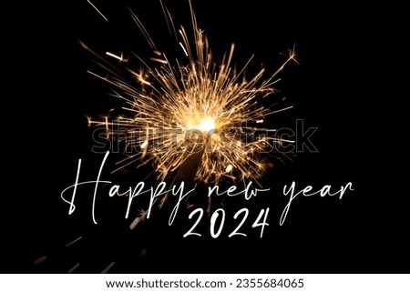 Happy new year 2024 orange sparkler new years eve countdown. Luxury entertainment celebration turn of the year party time. Premium nightlife visual with glowing light sparks on dark background