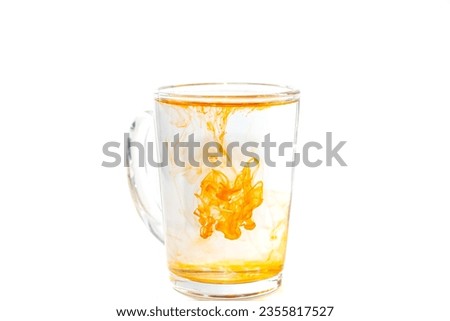 Pictures of abstract painting in the glass with orange paint color look great and beautiful design.