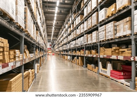 Nonthaburi, Thailand, June 17, 2023: Large warehouse corridors, warehouse storage and distribution of goods and goods on the shelf. IKEA is a furniture retailer that sells ready-to-assemble furniture. Royalty-Free Stock Photo #2355909967