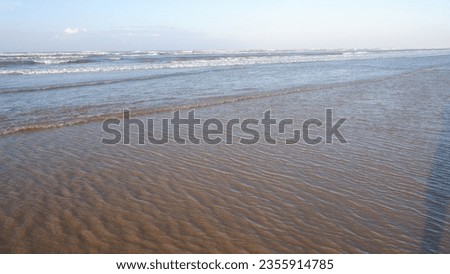 White sand, beautiful beach, beach atmosphere, beautiful waves on Lombang beach
